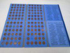 Two albums containing Lincoln head cent coins