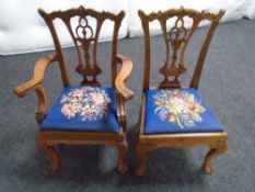 A reproduction child's Chippendale style armchair together with matching single chair