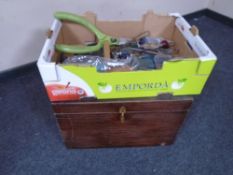 A vintage wooden storage box together hand tools, garden tools,