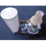 A box containing collectors plates, coasters, contemporary table lamps,