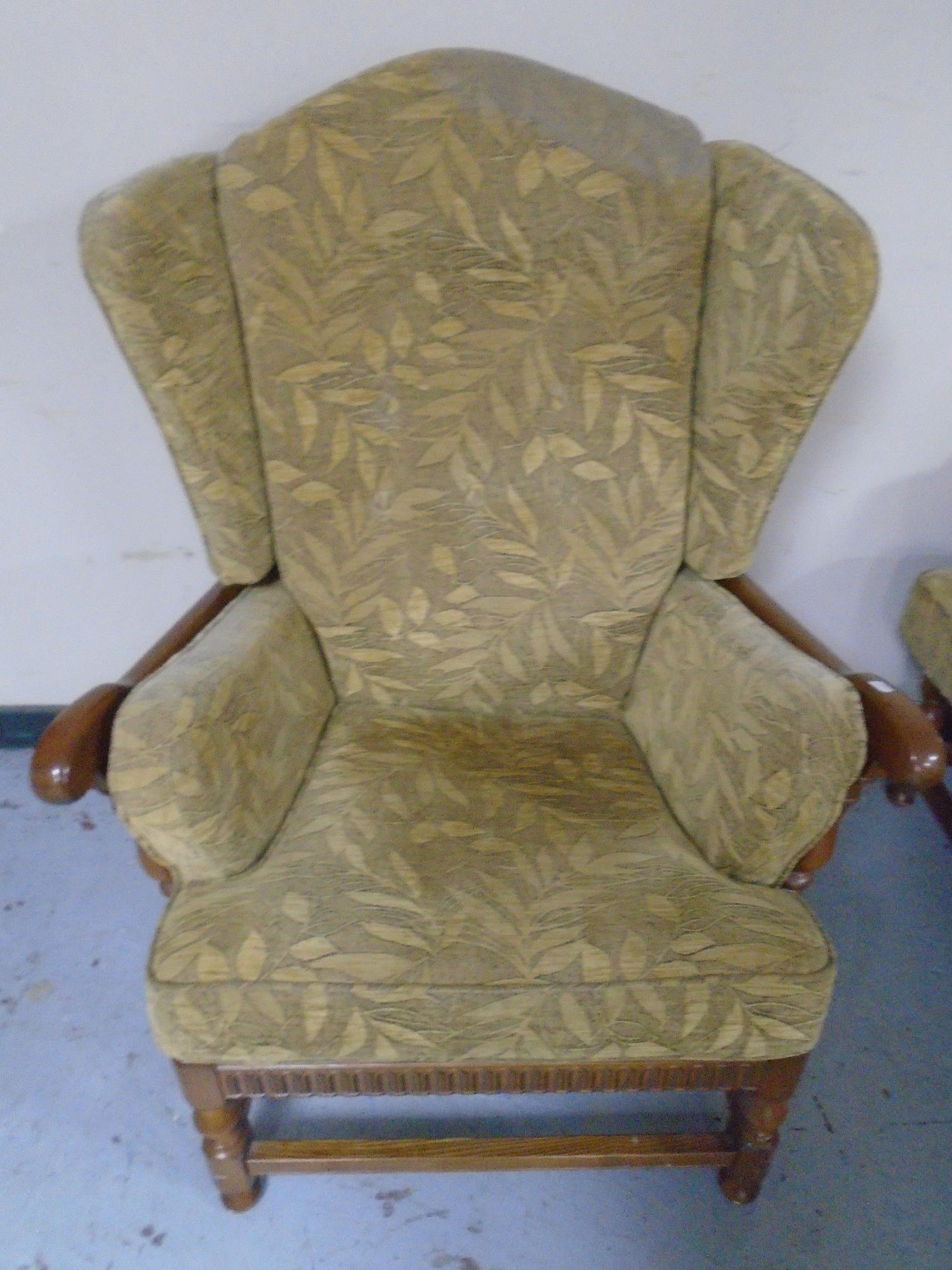 An Ercol elm and beech wood framed three piece lounge suite comprising of a three seater settee and - Image 2 of 2