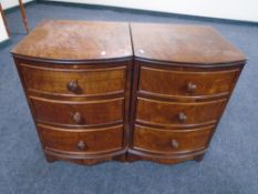 A pair of Victorian style three drawer bow fronted bedside chests.