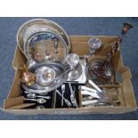 A box of plated wares including cutlery, three sconce table candelabrum, serving trays,