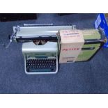 An Imperial 66 manual typewriter together with a further Petite typewriter in carry case with