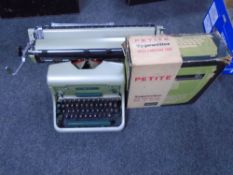 An Imperial 66 manual typewriter together with a further Petite typewriter in carry case with