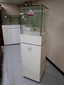 A jeweller's glass display cabinet on stand.