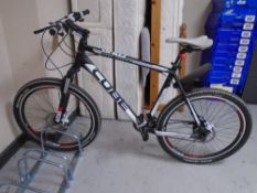 A Cube Attention Competition front suspension mountain bike.