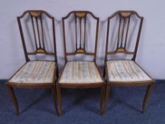 A set of three 19th century inlaid mahogany bedroom chairs.