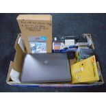 A box containing HP laptop, Garmin sat nav, Draper cordless screwdriver kit (new),