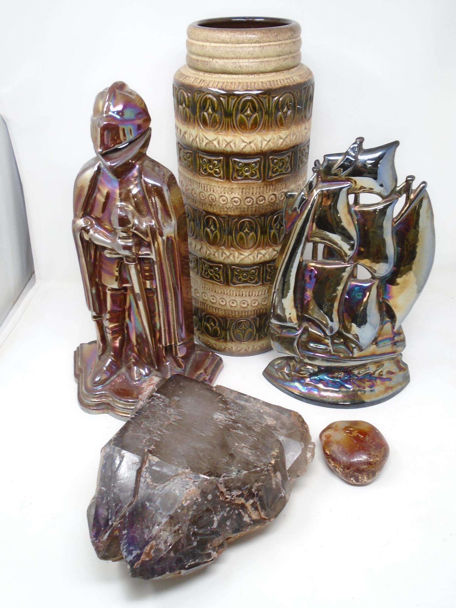 A tray containing West German pottery vase, large rock crystal specimen and one smaller example,