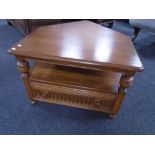 An Ercol Grasmere flap sided corner coffee table fitted with a drawer.