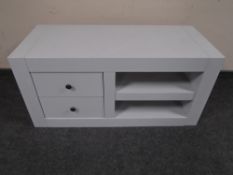 A painted contemporary entertainment stand fitted with shelves and two drawers.