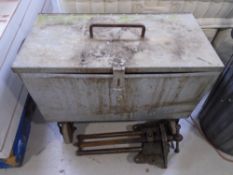 A galvanized metal box on castors containing pulleys, chains, hydraulic pumps,