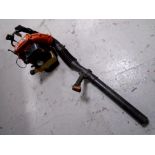 A Husqvarna 140b petrol garden leaf blower.