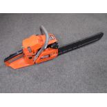 A Vehpro 58cc petrol chain saw.