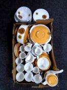 A box containing a large quantity of J & G Meakin studio pottery dinnerware.