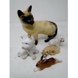 Two Royal Doulton figures of a Persian cat and hare,