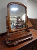 A Victorian mahogany toilet mirror.