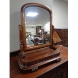 A Victorian mahogany toilet mirror.