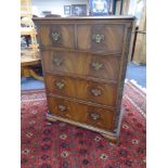 A Chapman's Siesta mahogany two-over-three five drawer chest.