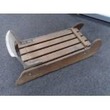 A wood and metal sledge.