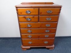 A Chateau pine eight drawer chest.