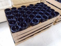 Four boxes containing a large quantity of plastic storage jars with lids.