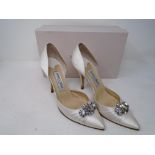 A pair of lady's Jimmy Choo size 38 pumps.
