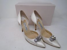 A pair of lady's Jimmy Choo size 38 pumps.