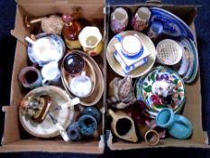 Two boxes containing porcelain plates, lustre vases, Bell's whisky decanter (empty) etc.