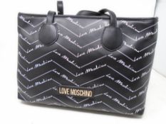 A Love Moschino all over logo handbag (new with tags).