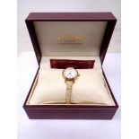 A lady's gold plated Rotary wristwatch in box.