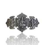 A silver belt buckle, probably Burmese.