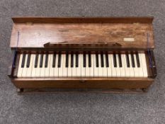 An Alderson & Brentnall travelling bellow organ, width 75 cm.