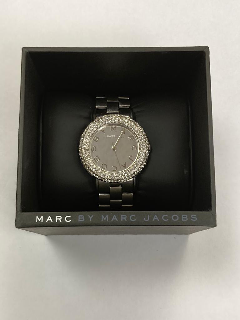 An encrusted wristwatch by Marc Jacobs, in retail box.