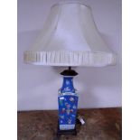 A Chinese porcelain vase converted to a table lamp.