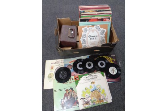 A box of vinyl LP's and 7" singles to include compilations, TV westerns,