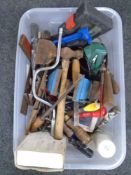 A box containing hand tools, bench vice, spirit level etc.