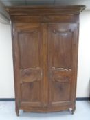 A French walnut double door armoire,