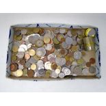 A box containing a quantity of foreign coinage.