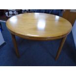 A mid-20th century Scandinavian circular teak extending dining table.