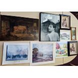 An assortment of various size prints including Audrey Hepburn etc