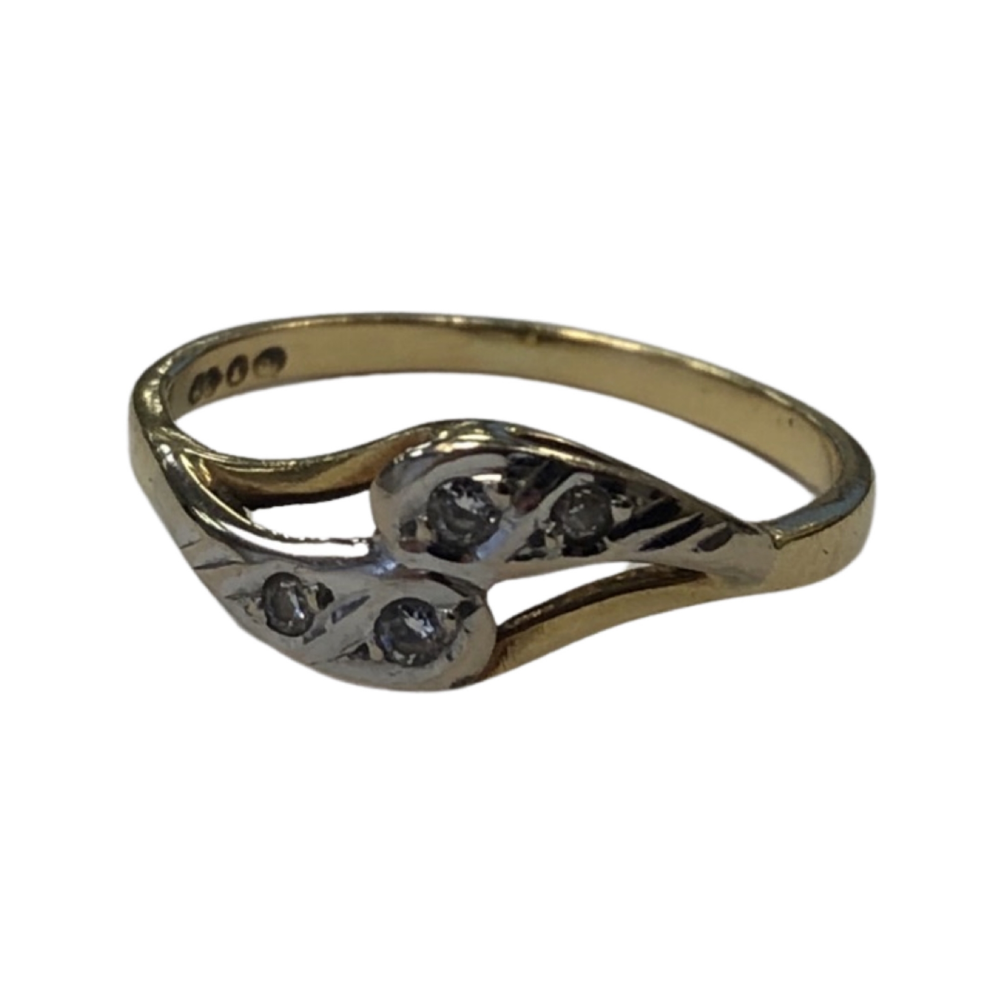 An 18 carat gold diamond set twist ring (1.9g).