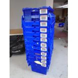 A collection of 12 plastic storage crates with lids.