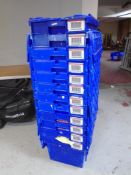 A collection of 12 plastic storage crates with lids.