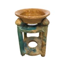 A Chinese Ming Dynasty (1368 - 1644) funeary wash basin and stand, height 19.