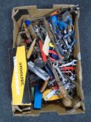 A box containing assorted hand tools, miniature vice, cordless air inflator etc.