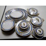 A collection of 28 pieces of Limoges gilt-rimmed dinnerware.