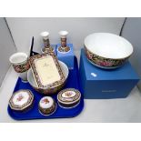 A tray containing Wedgwood Clio porcelain including a pair of dwarf candlesticks, picture frames,