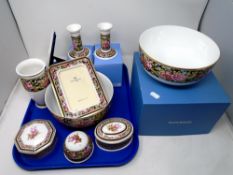 A tray containing Wedgwood Clio porcelain including a pair of dwarf candlesticks, picture frames,